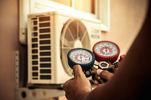 Professional Air Conditioning Service technician working in Douglass, TX